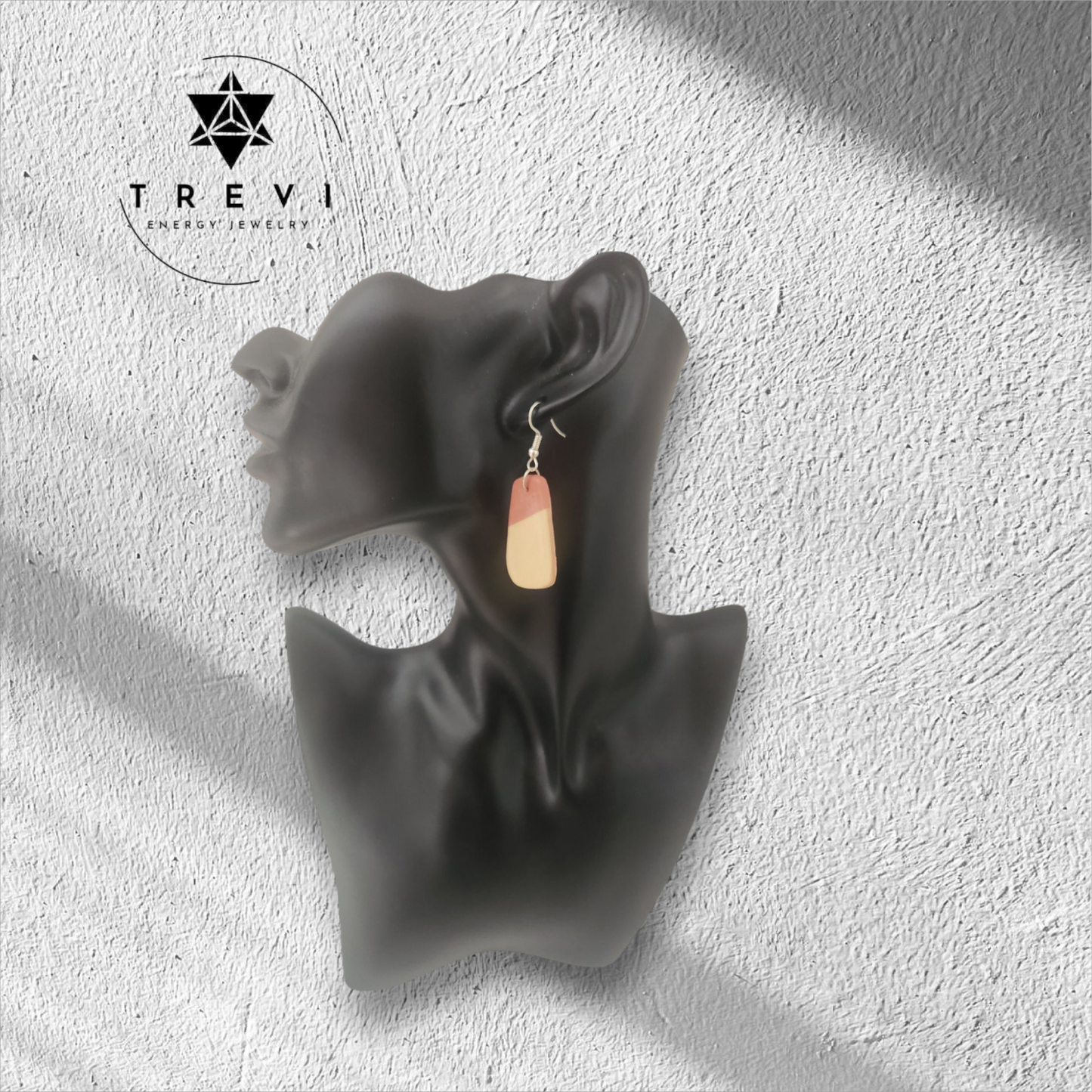 Rounded rectangular statement earring with light pink and cream color