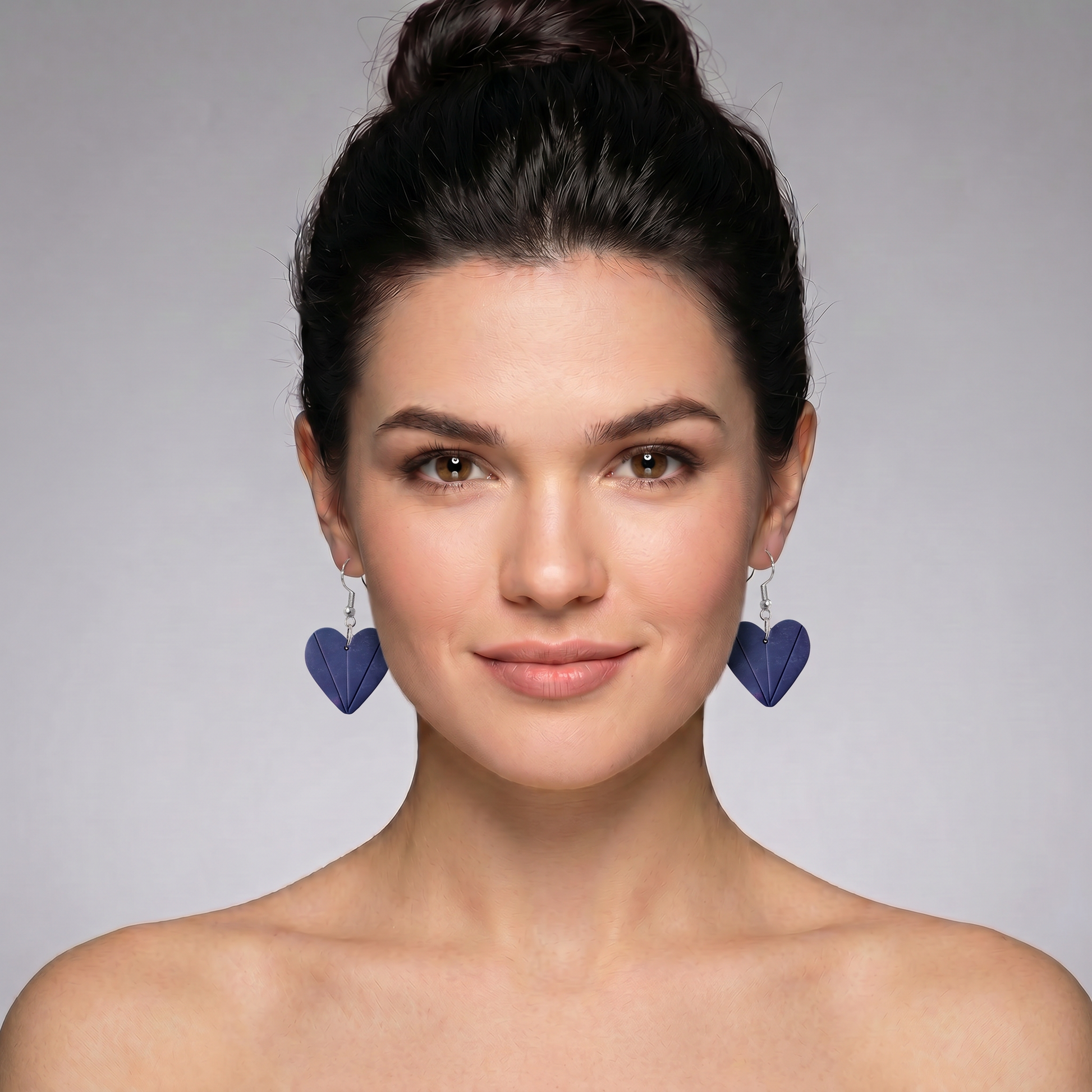 navy blue heart energy earrings worn by model spiritual handmade jewelry canada and usa