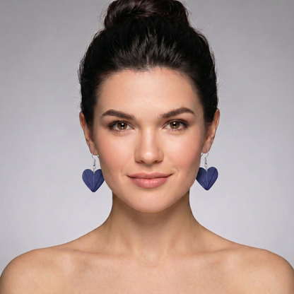 navy blue heart energy earrings worn by model spiritual handmade jewelry canada and usa