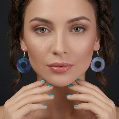 blue purple infinite ring earrings on model spiritual jewelry
