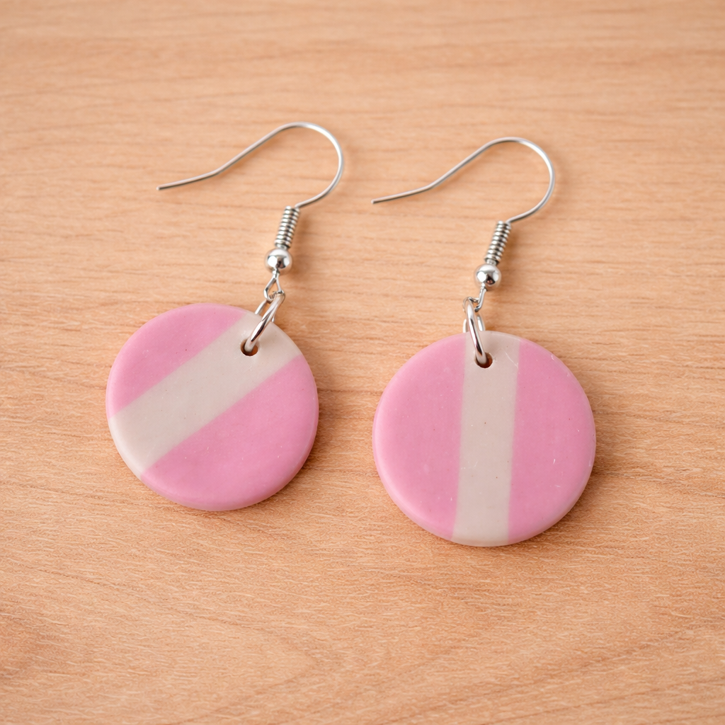 circle life earrings flat lay handmade pink round earrings