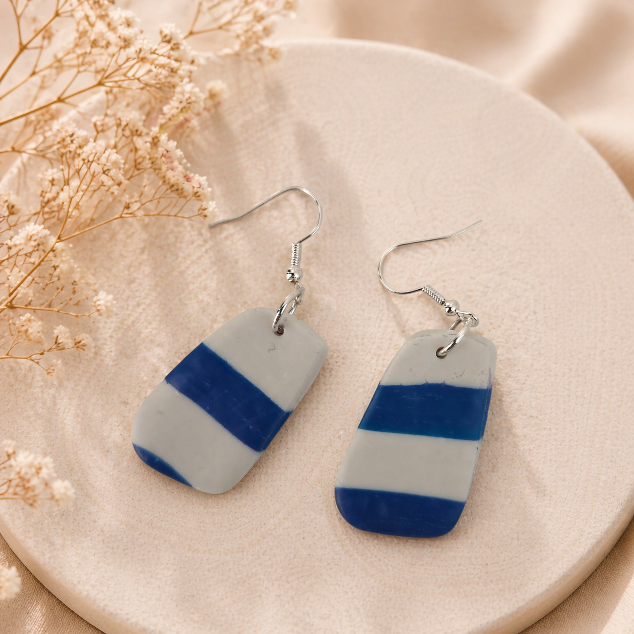 soft rectangle earrings blue striped handmade earrings flatlay