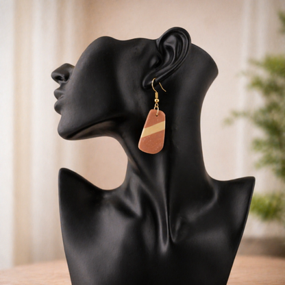 soft rectangle earrings on mannequin earth tone handmade jewelry