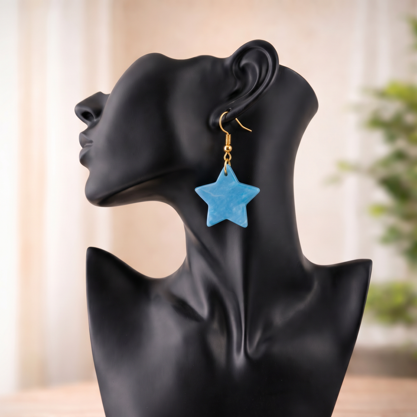 star earrings sacred geometry on mannequin blue earrings