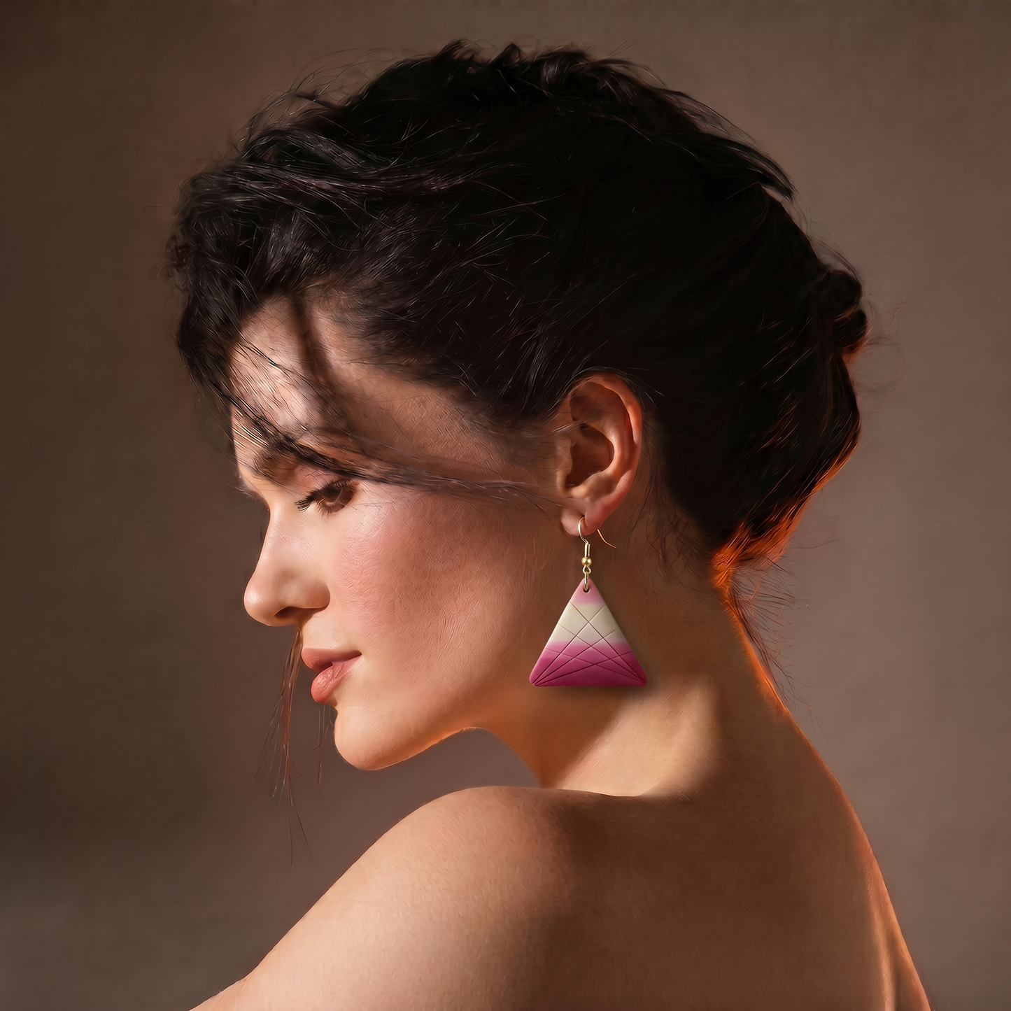 Woman wearing triangle grid earrings modern geometric jewelry