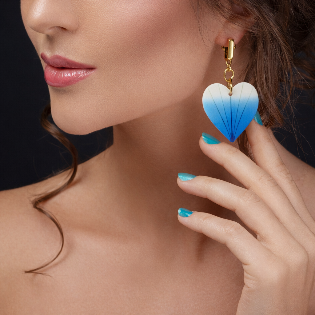 blue gradient heart earrings worn model lightweight statement jewelry